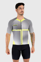 A man wearing a black and yellow striped cycling top with short sleeves and a front zipper.