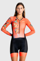 Person wearing a colorful cycling suit on a white background