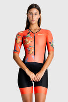 Person wearing a colorful cycling suit on a white background